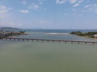 Fototapeta premium ドローンで空撮した京都丹後鉄道の由良川橋梁