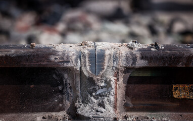Closeup of repaired welded railway road