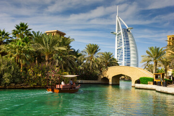 View of the hotel Burj Al Arab from Souk Madinat Jumeirah - obrazy, fototapety, plakaty