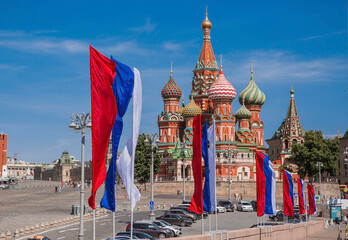 Russia. Moscow. The national flag of the Russian Federation on the background of St. Basil's Cathedral on Vasilievsky Descent. Russian tricolor. The holiday is Russia Day on June 12.