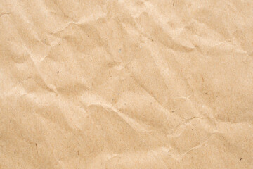 Abstract crumpled and creased recycle brown paper texture background