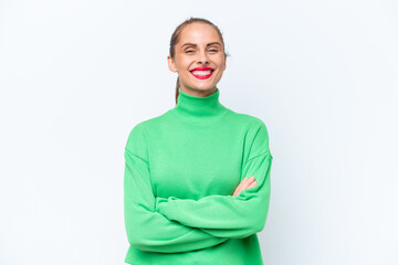 Young caucasian woman isolated on white background keeping the arms crossed in frontal position