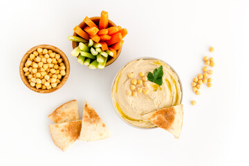 Chickpea hummus with vegetables sticks and pita croutons