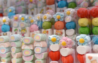 Marshmallow on a stick. Marshmallow candies.
