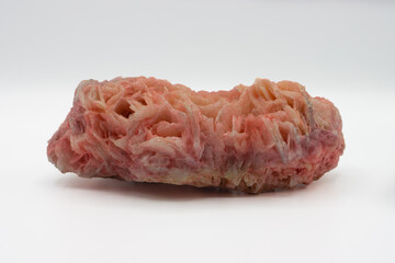 Pink rhodochrosite crystal. Mineral stone