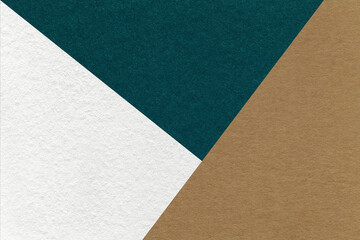Fototapeta na wymiar Texture of craft white, brown and teal shade color paper background, macro. Vintage abstract emerald cardboard