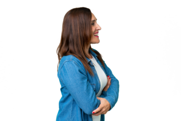 Middle age woman over isolated chroma key background laughing in lateral position