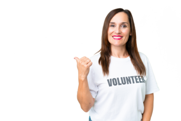 Middle age volunteer woman over isolated chroma key background pointing to the side to present a product