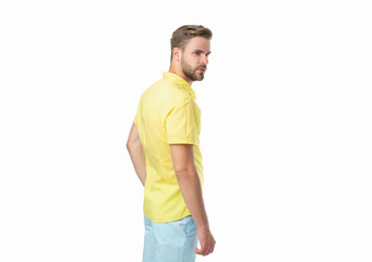 trendy man on background. trendy man in studio. photo of trendy man wearing yellow shirt.