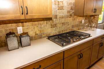 Kitchen Counter Top With Gas Stove Top And Decorator Items