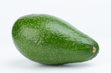 Perspective view on green avocado fruit
