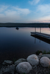 Fishermen Move Onto Lake in Early Morning Light