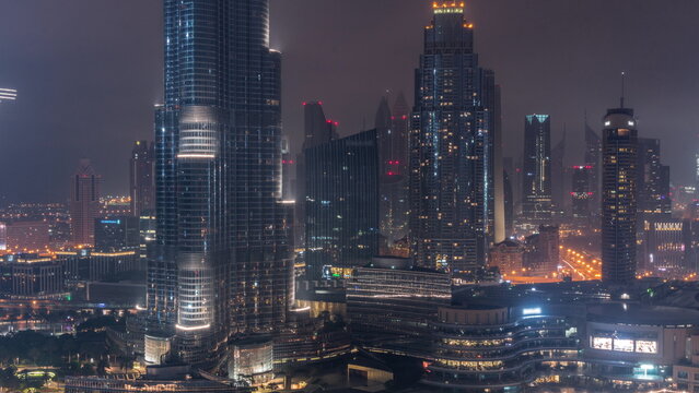 Aerial view of Dubai city all night timelapse in downtown.