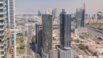 Aerial view of media city and al barsha heights district area all day timelapse from Dubai marina.