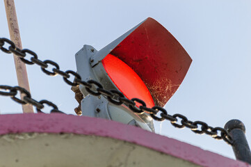 Red Traffic Lights at the Top of Sea Lighthouse