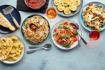 Pasta variety with copy space. Italian food and drinks, overhead flat lay shot