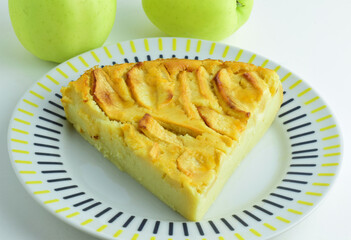 Homemade. Apple pie, in porcelain dish and light background.