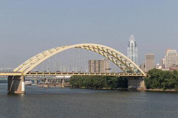 Cincinnati Downtown Skyline including the Great American tower and Daniel Carter Beard Bridge along the Riverfront.