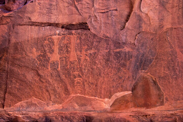 Petroglyphs of human figures in Khazali Canyon in Jordan's Wadi Rum desert