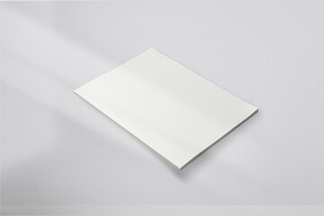 Realistic top view cover and opened portrait A4 or A5 magazine or brochure booklet for stationery and branding. Mockup template isolated light grey background and leaf shadow overlay. 3D rendering.
