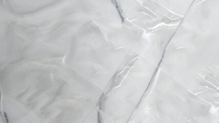 Obraz premium Elegant light gray marble texture with subtle white and dark gray veins, ideal for luxury interior design backgrounds, product displays, or sophisticated branding.