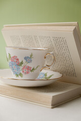 Teacup on book

