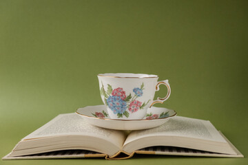 Teacup on book
