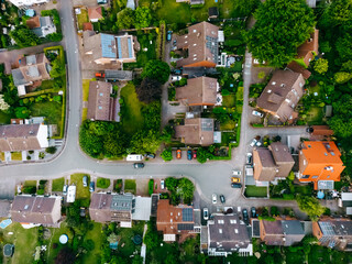 Scenic landscape from above aerial view of houses in small town in countryside Germany .