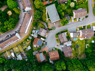 Scenic landscape from above aerial view of houses in small town in countryside Germany .