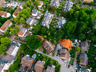 Scenic landscape from above aerial view of houses in small town in countryside Germany .
