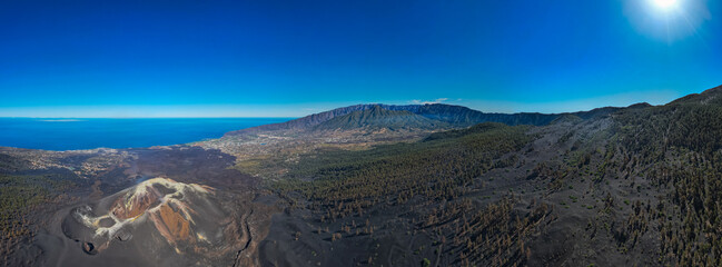 Aerial view above volcanic crater