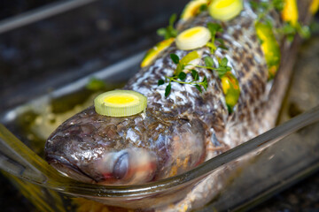 Traditional mullet fish ( Mugil cephalus, Chelon labrosus, Agonostomus monticola, Liza ramada or Mugil curema). Roasted tainha fish.