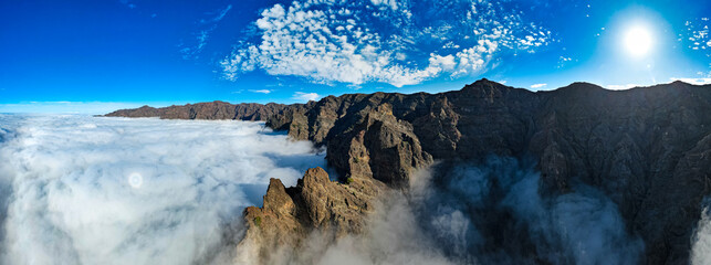 Aerial panoramic above the clouds at the beautiful Caldera de Taburiente National Park in La Palma...