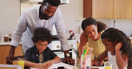 Family, school homework and children with parents for help with learning, lesson and studying at home. Education, teaching and mother, father and kids writing, drawing and do activity for development - Powered by Adobe