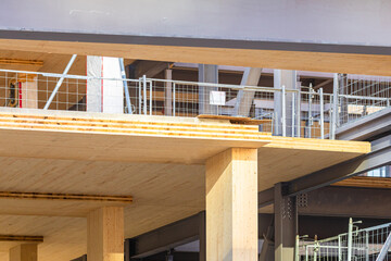 Detail of a laminated floor panel and vertical column of a mass timber multi story green,...