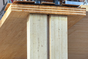 Detail of an laminated mass timber multi story green, sustainable, residential high rise apartment...