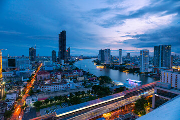 Fototapeta na wymiar Aerial view of Bangkok city overlook Bangkok city, tiny world, high rise building, road, fish eyes lenses, Tourist destination in Thailand.