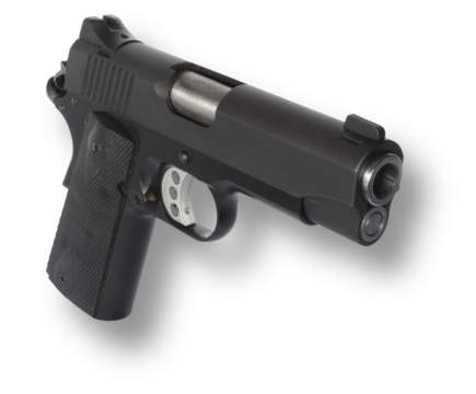 Shadow behind a 1911 pistol