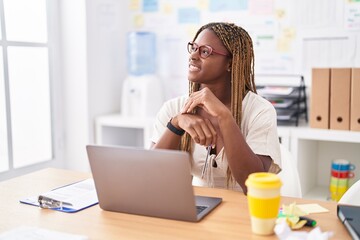 African american woman business worker using laptop working at office