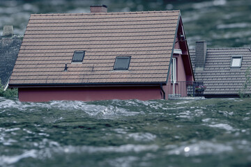Flooded houses under water, the flood. Environmental disaster in Ukraine.