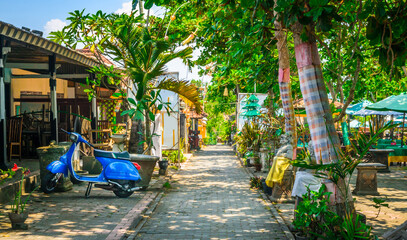 Fototapeta na wymiar Traditional Bali cafe with decorated umbrellas, Indonesia