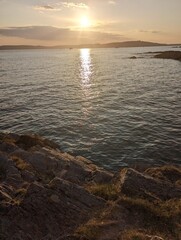 Amber sunset British coastline beach