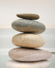 Fototapeta na wymiar Balancing Serenity: Stacked Stones in Nature
