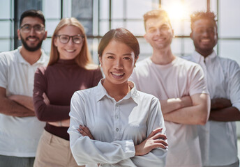 Business people looking at the camera during a business meeting in a modern office