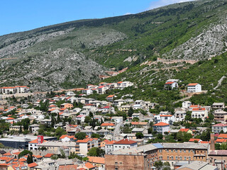 Naklejka premium View of the town of Senj in the Kvarner Bay and residential houses on the slopes of Velebit from Nehaj fortress - Croatia (Pogled na grad Senj u kvarnerskom zaljevu i kuće na obroncima Velebia)
