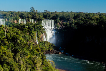 Fototapeta na wymiar View of the Iguazu Falls, border between Brazil and Argentina. located in the Iguaçu National Park, a UNESCO World Heritage Site.