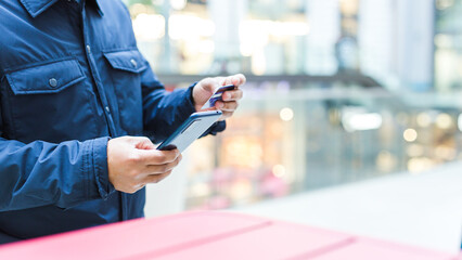 online shopping concept, businessman use smartphones and credit cards to purchase products from online stores and shop on the internet, ecommerce store, online business