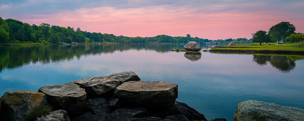 Sunrise over the lake. Beautiful tranquil morning landscape in coastal New England.
