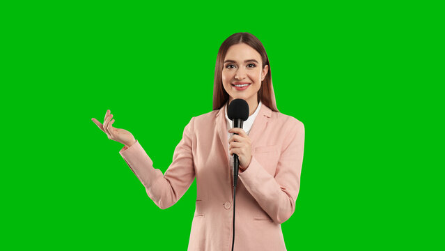 Chroma key compositing. Broadcaster with microphone against green screen, banner design