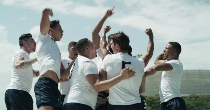 Sports, rugby team celebrating and on a field together for win or success. Achievement or victory, teamwork or collaboration with people, and sport teammates with winner celebration on pitch outdoors